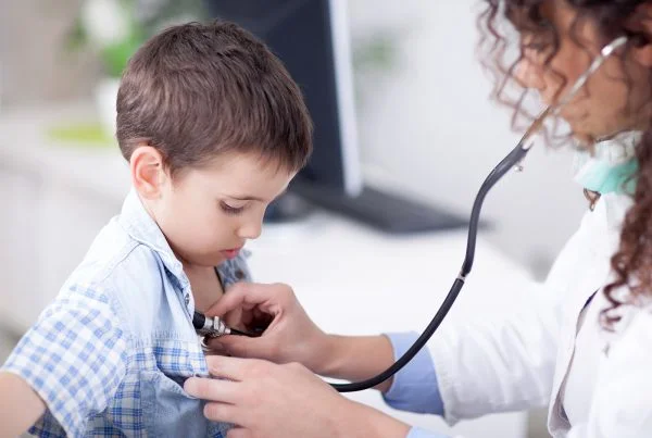 Boy getting a doctors checkup image